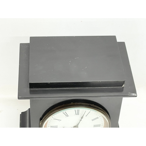 702 - A Victorian slate mantle clock. With pendulum. 22x15x28.5cm