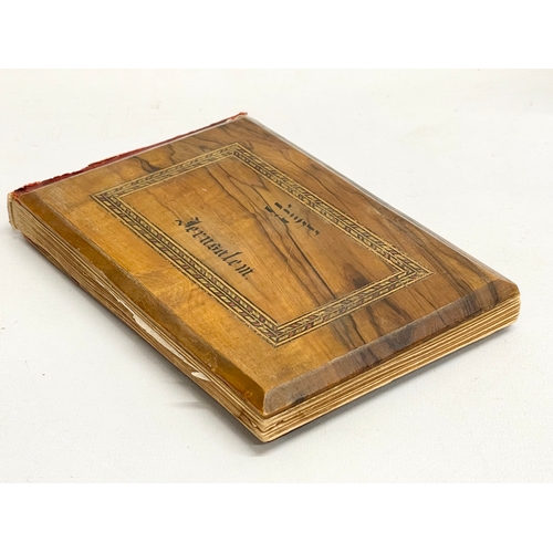 715 - An early 20th century Olive Wood album titled Flowers of the Holy Land. 18x12cm