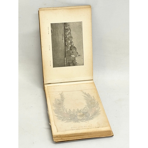 715 - An early 20th century Olive Wood album titled Flowers of the Holy Land. 18x12cm