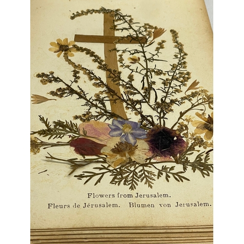 715 - An early 20th century Olive Wood album titled Flowers of the Holy Land. 18x12cm