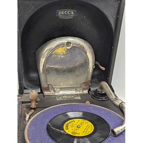 585V - An early 20th century Decca portable gramophone. 31x39x18cm