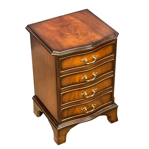 521X - A small Georgian style mahogany serpentine front chest of drawers.  41x36x61cm