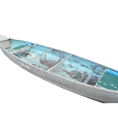 116 - A large canoe. 519cm