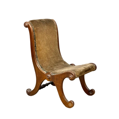 119 - A small Victorian mahogany nursing chair.