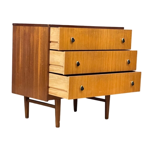 125 - A Mid Century teak chest of drawers. 76x43.5x73cm