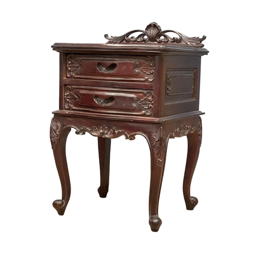 218 - An ornate end table with 2 drawers on cabriole legs. 48x42x76cm