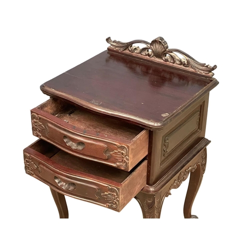 218 - An ornate end table with 2 drawers on cabriole legs. 48x42x76cm