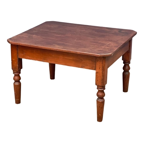 260 - A Victorian pine and mahogany cut down table. 94x77.5x60cm