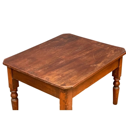 260 - A Victorian pine and mahogany cut down table. 94x77.5x60cm