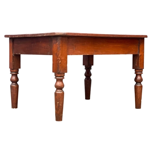 260 - A Victorian pine and mahogany cut down table. 94x77.5x60cm