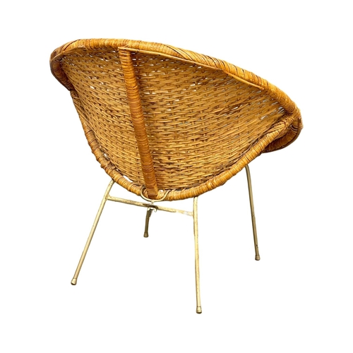 32 - A 1960’s Mid Century wicker bucket chair.