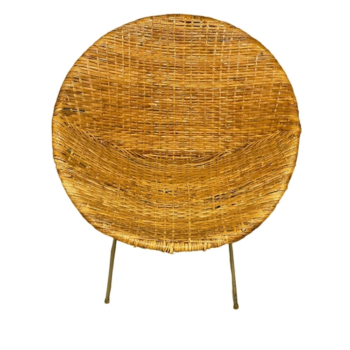 32 - A 1960’s Mid Century wicker bucket chair.