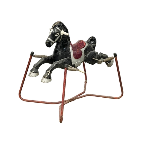 320 - A vintage child’s rocking horse by Mobo