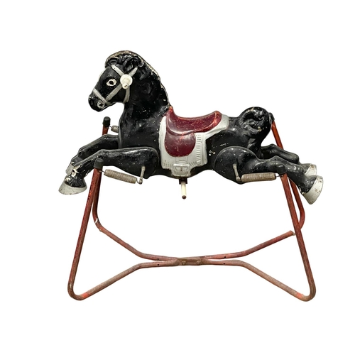 320 - A vintage child’s rocking horse by Mobo