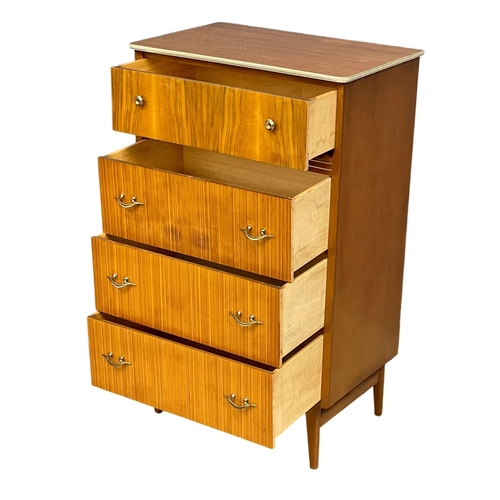 34 - A 1960’s Mid Century tallboy chest of drawers. 64x41x106.5cm