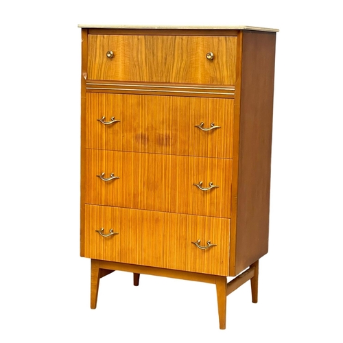 34 - A 1960’s Mid Century tallboy chest of drawers. 64x41x106.5cm