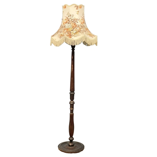 35 - A vintage standard lamp. 178cm