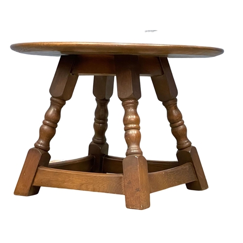 372 - A vintage oak end table. Ercol style. 56x39cm