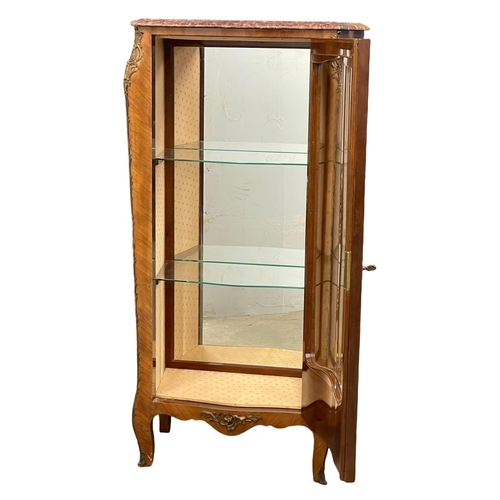 1617 - An 18th century style French marble top Vitrine with brass ormolu mounts. 73x44x156cm