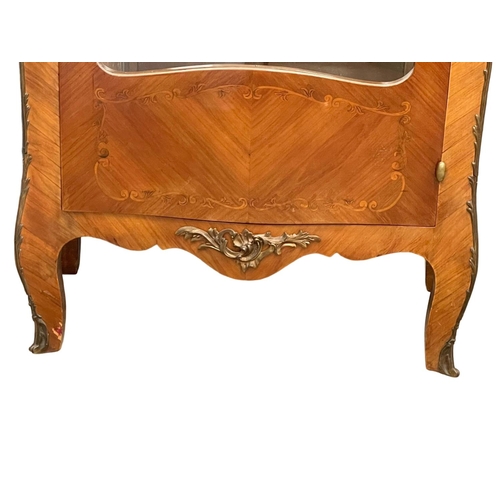 1617 - An 18th century style French marble top Vitrine with brass ormolu mounts. 73x44x156cm