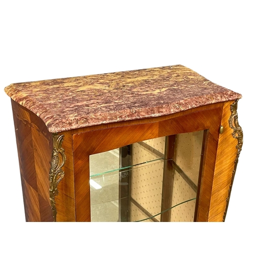 1617 - An 18th century style French marble top Vitrine with brass ormolu mounts. 73x44x156cm