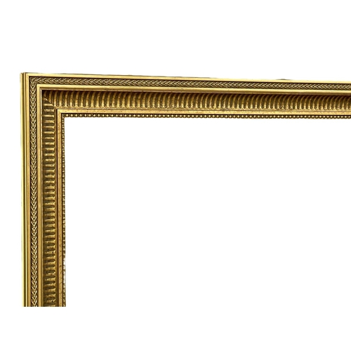 1623 - A large ornate gilt framed mirror.  137x107cm