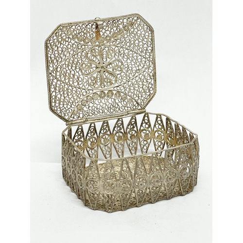 800 - An ornate silver trinket box.