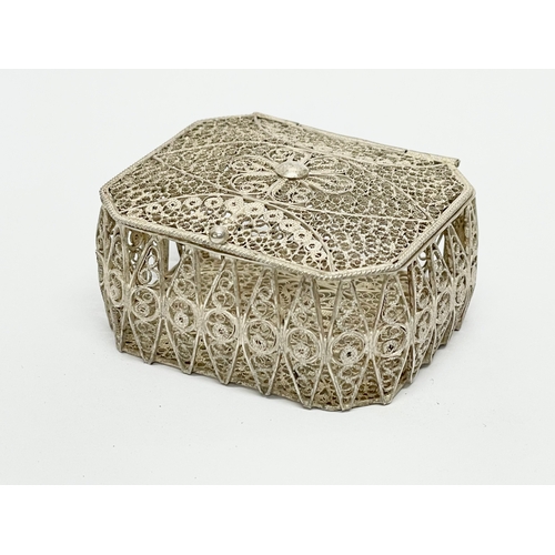 800 - An ornate silver trinket box.