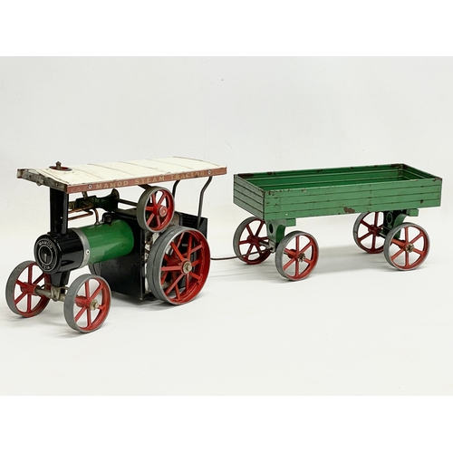 136 - A Mamod Steam Tractor and trailer 58cm