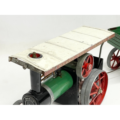 136 - A Mamod Steam Tractor and trailer 58cm