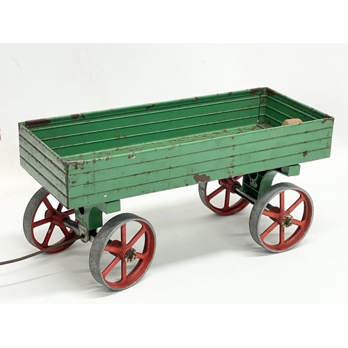 136 - A Mamod Steam Tractor and trailer 58cm