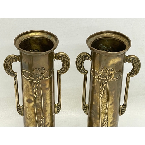 3 - A pair of early 20th century Art Nouveau bras vases by Beldray. 25.5cm.