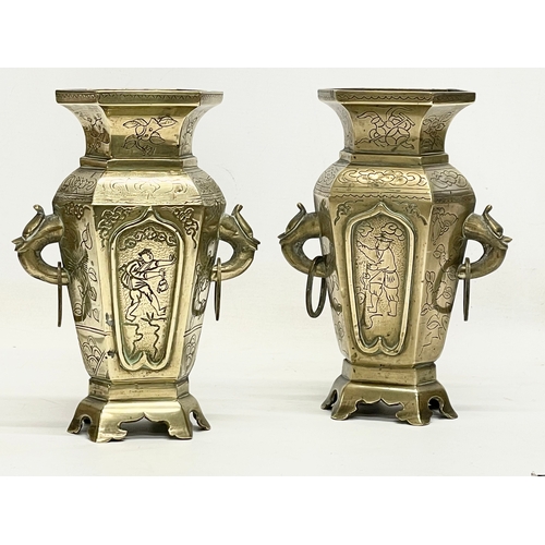 A pair of late 19th century Chinese brass vases. 15x21cm
