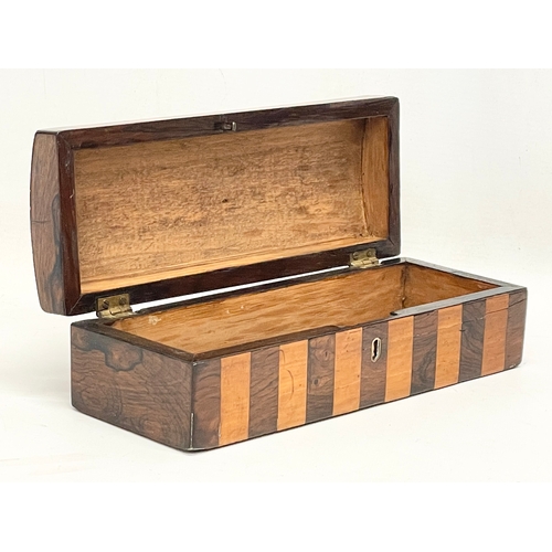 8 - A Victorian Rosewood and Satin Wood box. 24x9x6.5cm