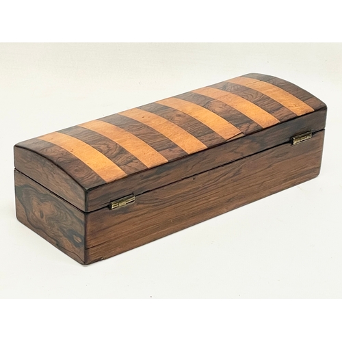 8 - A Victorian Rosewood and Satin Wood box. 24x9x6.5cm