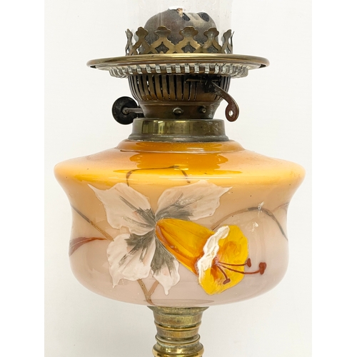 36 - A Victorian double burner oil lamp. 64cm.