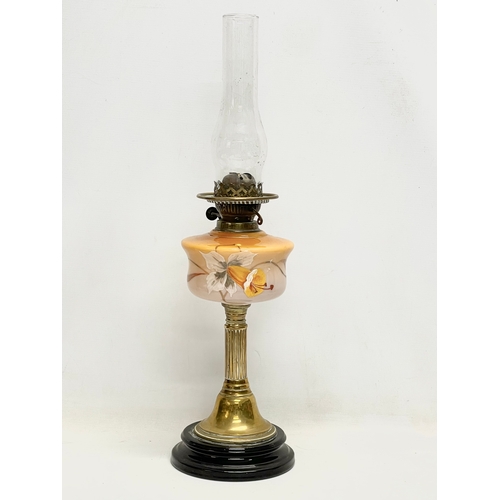 36 - A Victorian double burner oil lamp. 64cm.