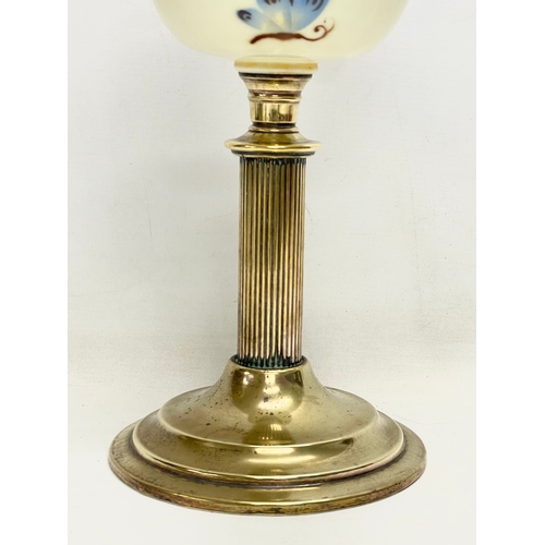 37 - A Victorian double burner oil lamp. 65cm