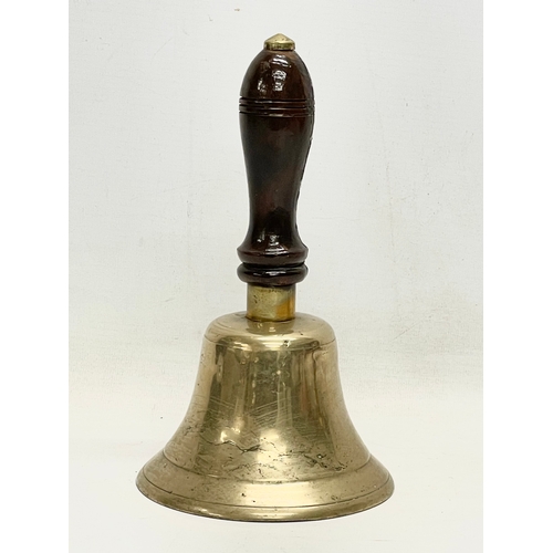 39 - A vintage brass bell. 22cm