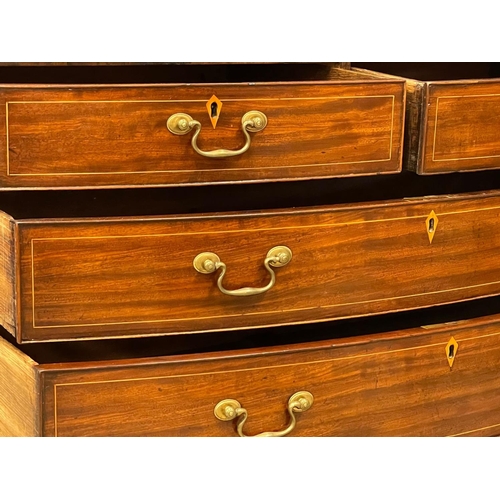 1621 - A George III inlaid mahogany bow front chest of drawers with brass drop handles. Circa 1790-1800. Wi... 