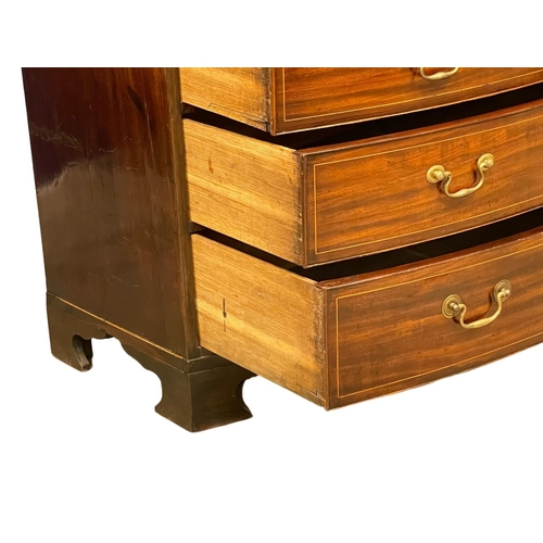 1621 - A George III inlaid mahogany bow front chest of drawers with brass drop handles. Circa 1790-1800. Wi... 