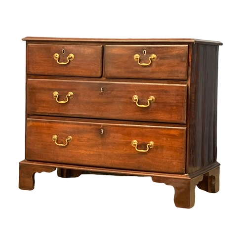 1619 - A fine proportioned George III mahogany chest of drawers with brass drop handles on bracket feet. Ci... 