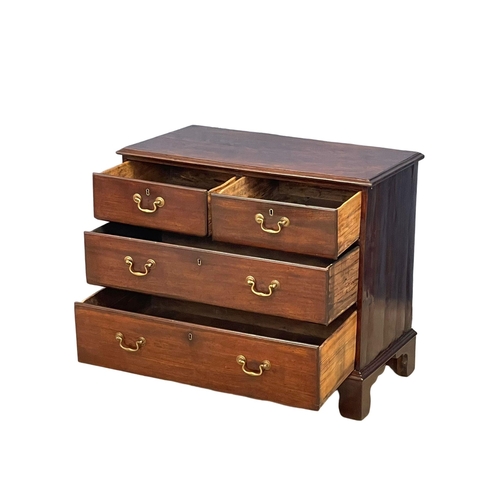 1619 - A fine proportioned George III mahogany chest of drawers with brass drop handles on bracket feet. Ci... 