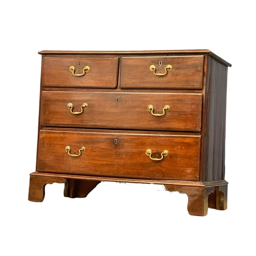 1619 - A fine proportioned George III mahogany chest of drawers with brass drop handles on bracket feet. Ci... 