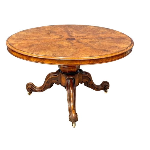 1613 - A Victorian Burr Walnut and Walnut tilt top pedestal breakfast dining table. Circa 1860. 128x74.5cm