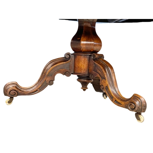 1613 - A Victorian Burr Walnut and Walnut tilt top pedestal breakfast dining table. Circa 1860. 128x74.5cm