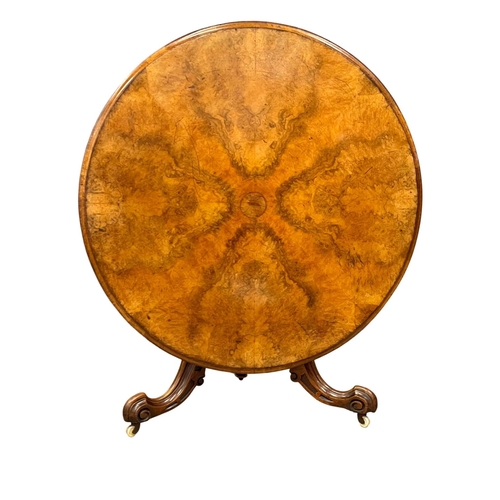 1613 - A Victorian Burr Walnut and Walnut tilt top pedestal breakfast dining table. Circa 1860. 128x74.5cm