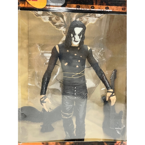 151 - 3 unopened action figures. A McFarlane Toys 12” Collectibles ‘The Crow’ action figure in box. A McFa... 