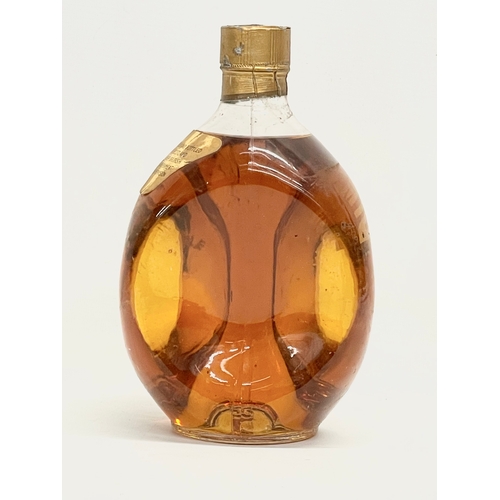 154 - A vintage Haig’s Dimple Whisky. 20.5cm