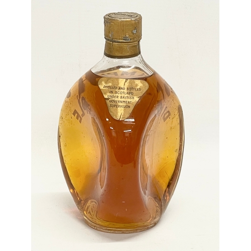 154 - A vintage Haig’s Dimple Whisky. 20.5cm